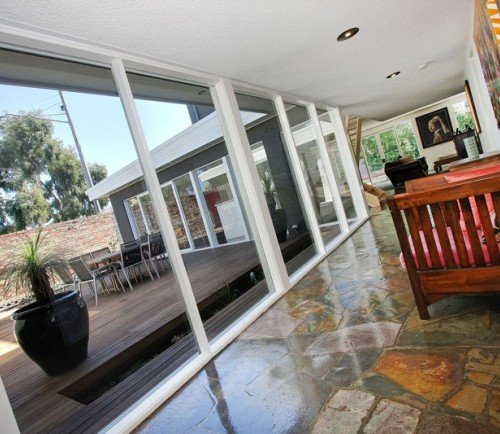 a glass door leading to a patio