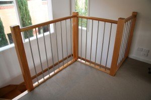 a wooden railing in a room