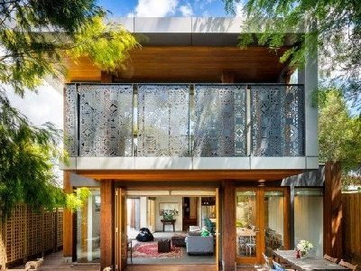 Front View of a Double Storey House with a Balcony