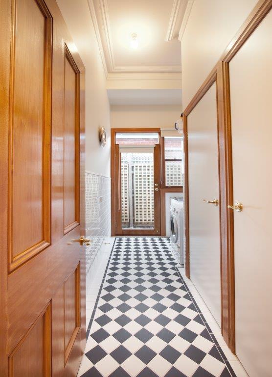 a hallway with a checkered floor