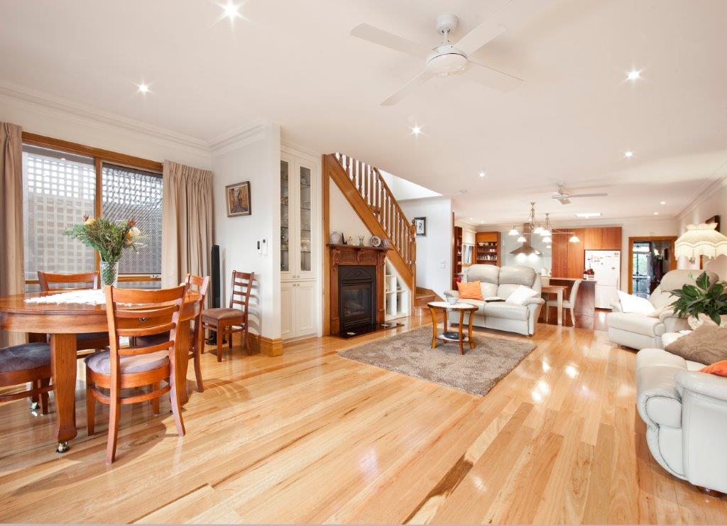 a living room with a wood floor