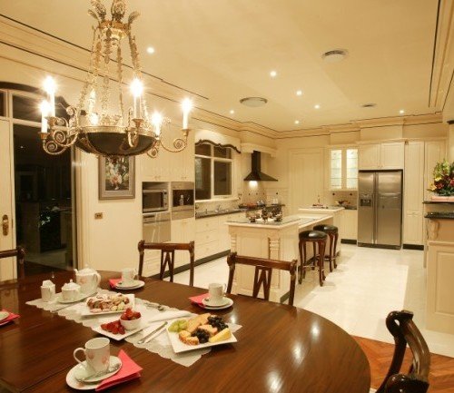 a large kitchen with a dining table