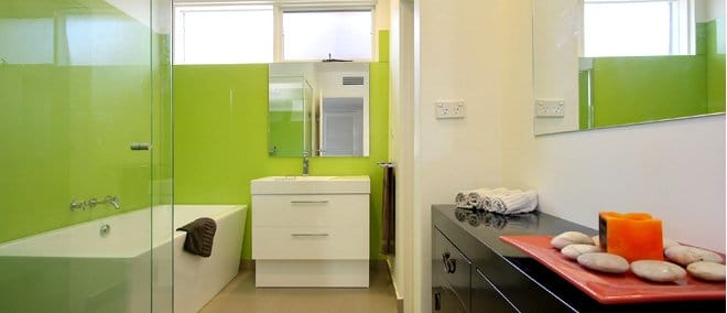 a bathroom with a tub and sink