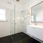 a bathroom with a glass shower