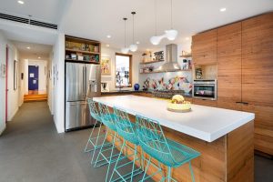 a kitchen with a table and chairs