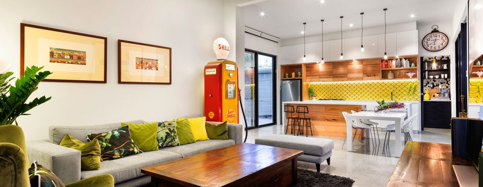 a living room with a couch and a table