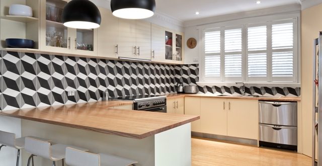 a kitchen with white cabinets