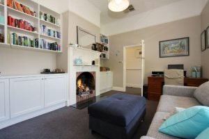 a living room with a fireplace