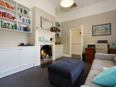 a living room with a fireplace