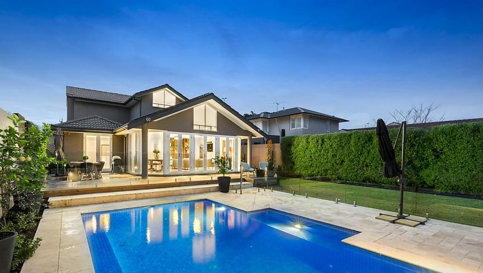 a swimming pool in a backyard