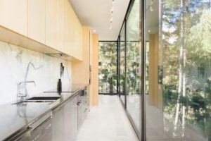 a kitchen with white cabinets