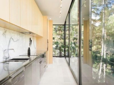 a kitchen with white cabinets