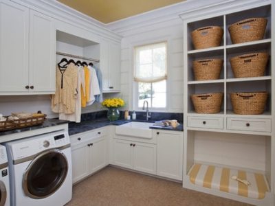 a kitchen with white cabinets