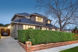 a house with a brick driveway