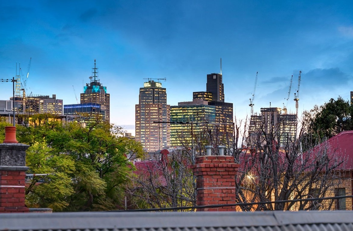 a city skyline with trees