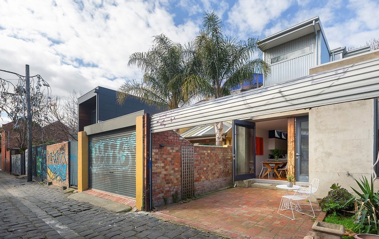 a house with a brick patio