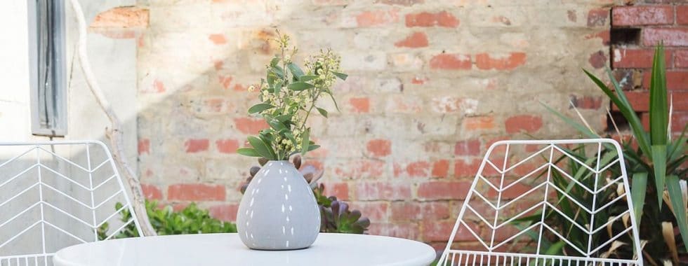 a table and chairs outside