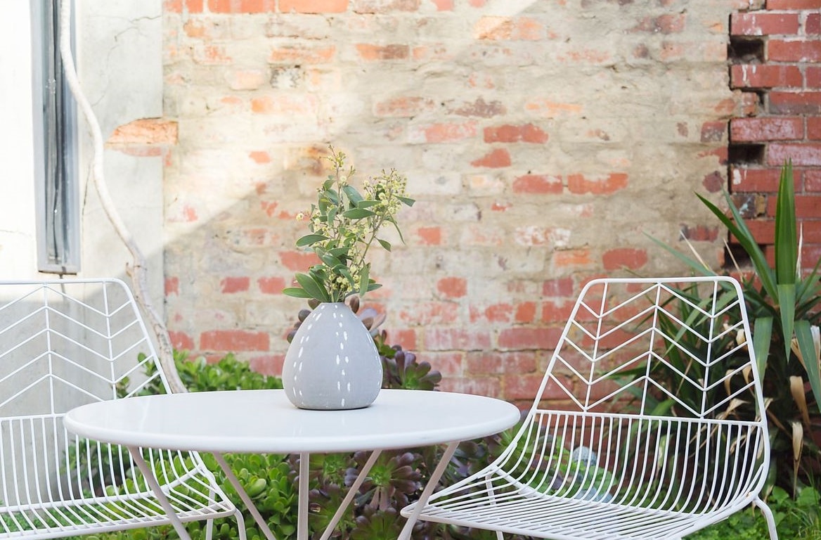 a table and chairs outside