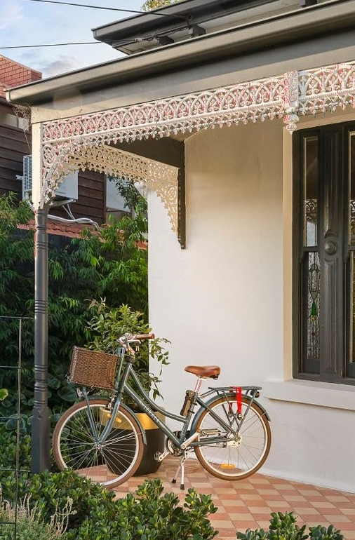 a bicycle parked outside a house