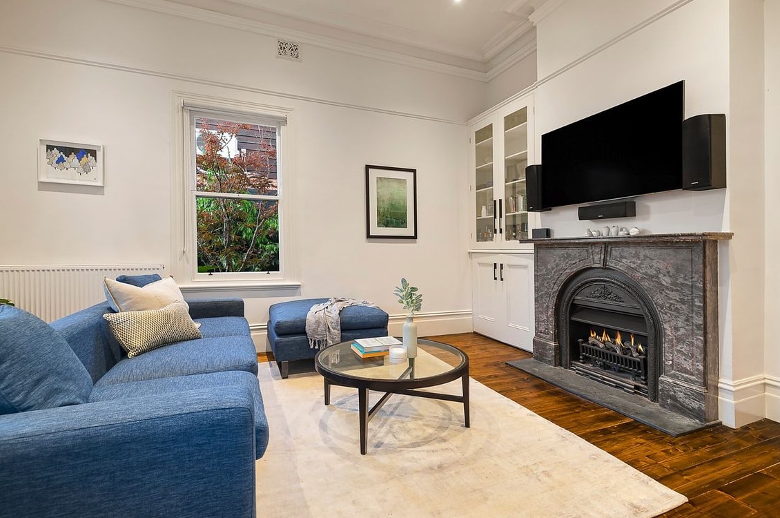 a living room with a fireplace