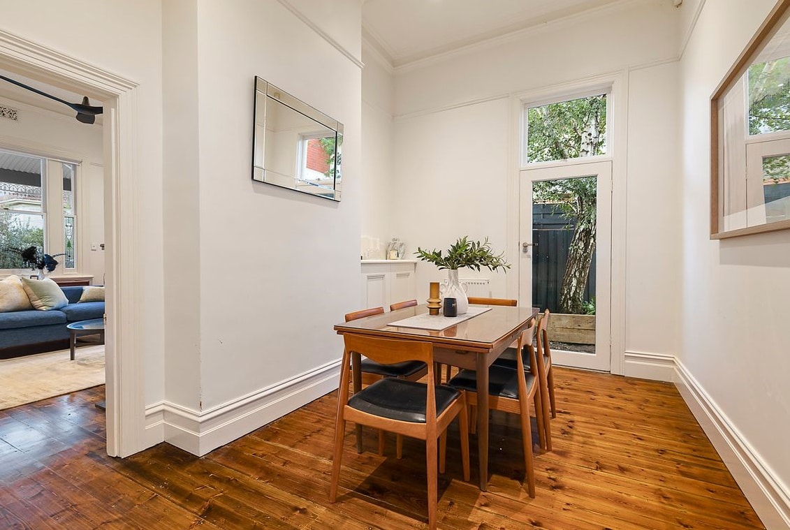 a dining room table with chairs