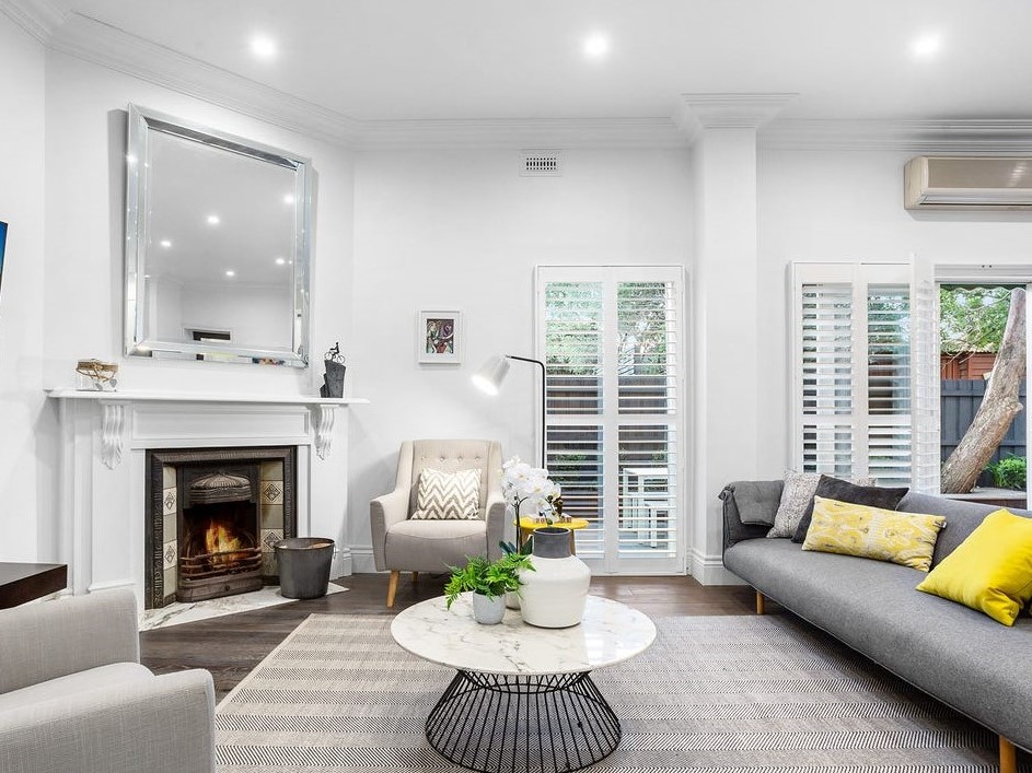 a living room with a fireplace