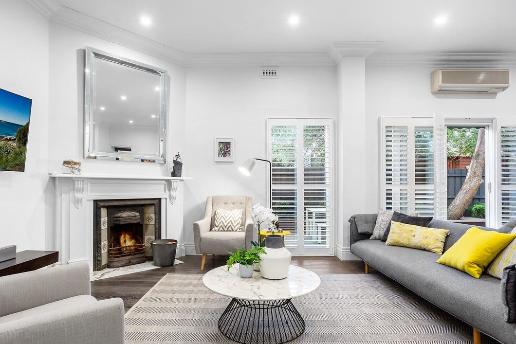 a living room with a fireplace