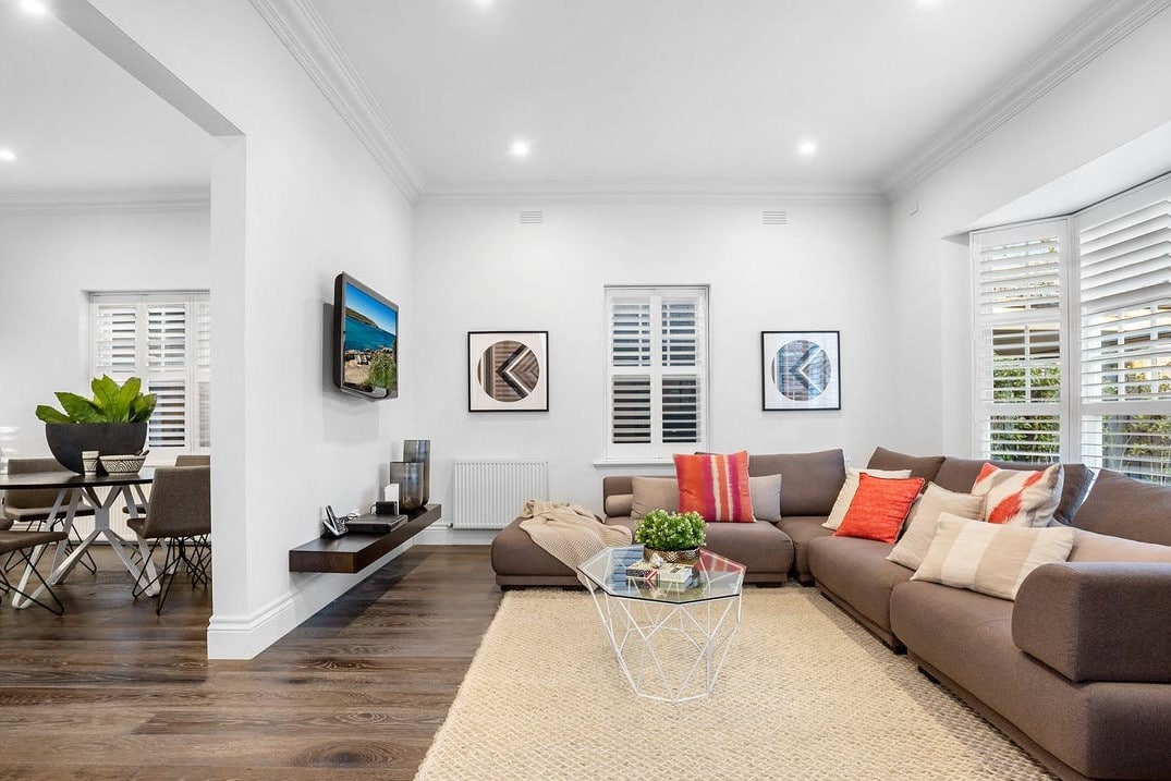 a living room with a couch and a coffee table