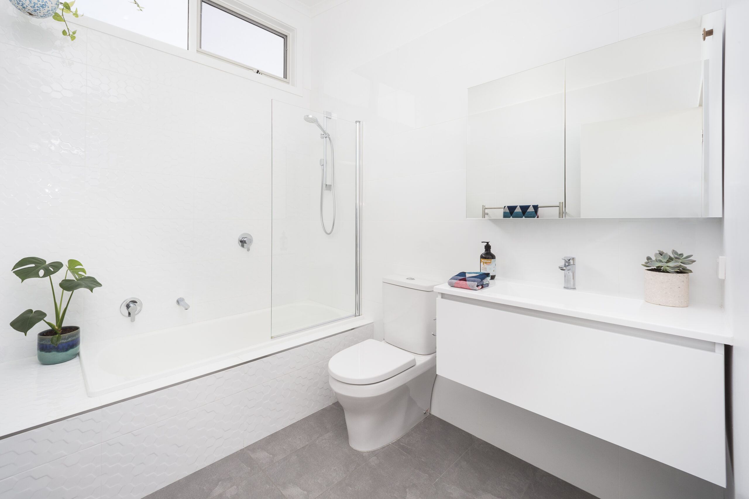 a bathroom with a toilet and sink