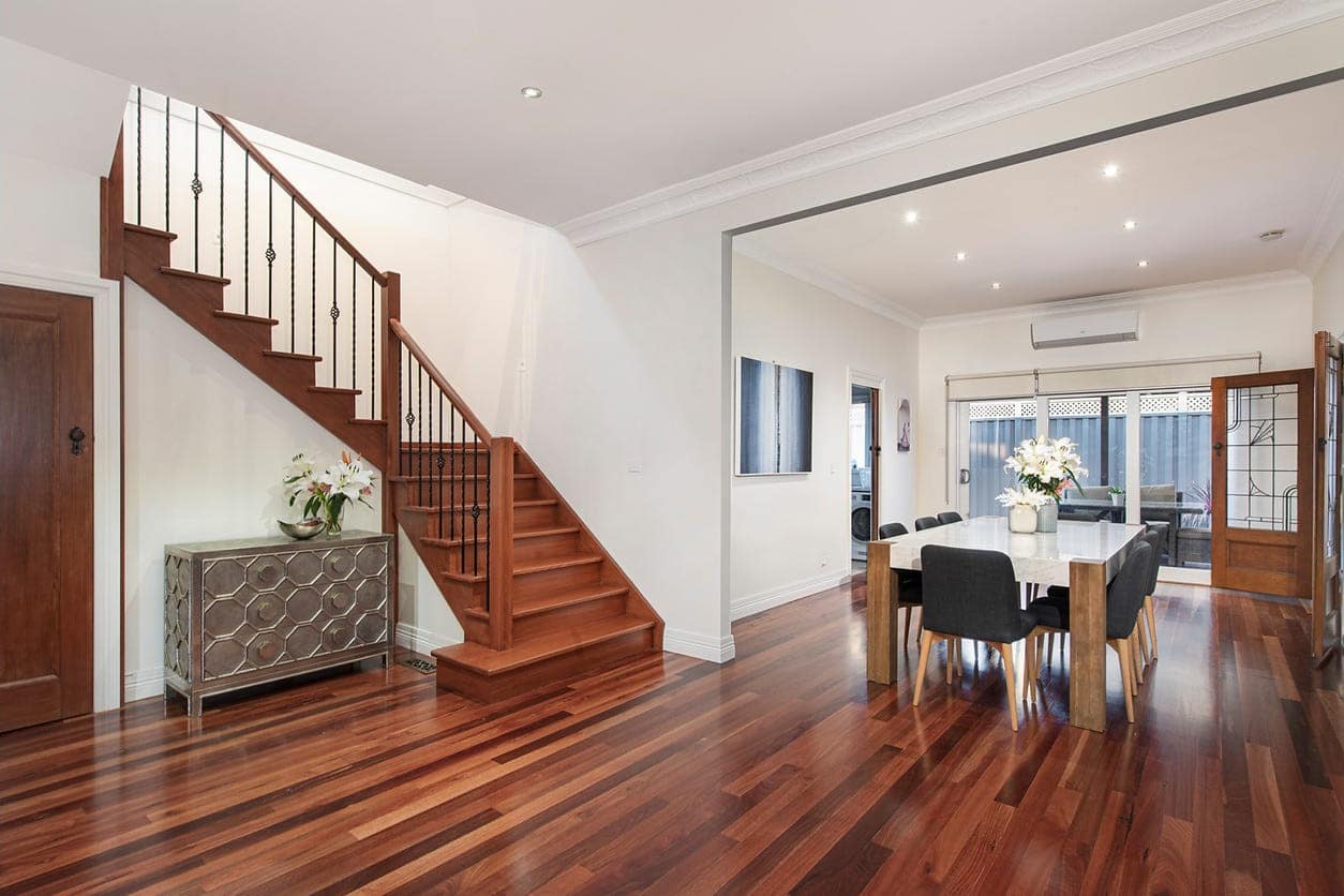 a dining room with a wood floor