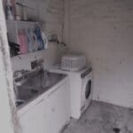 a washing machine in a room