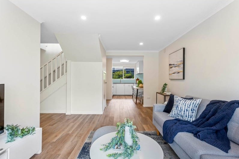 a living room with a wood floor