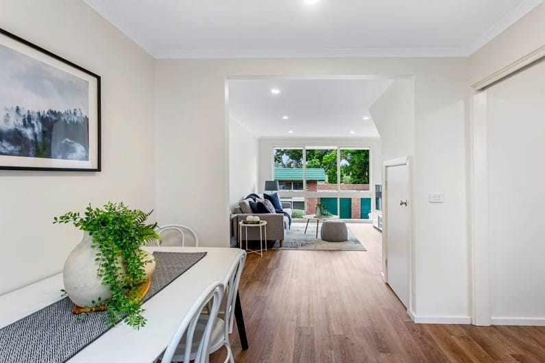 a living room with a wood floor