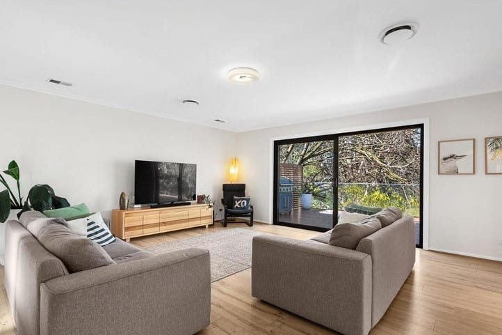 a living room with a large window