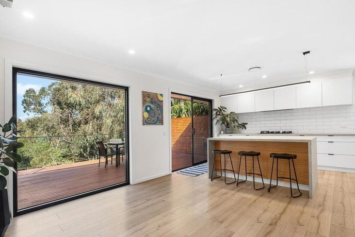 a room with a table and chairs