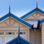 Decorative gables with blue roof trim and finials