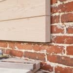 How to Add a Weatherboard Extension to Your Brick House?