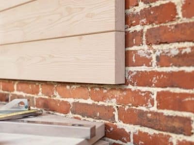 How to Add a Weatherboard Extension to Your Brick House?